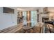 Bright living room with wood floors, fireplace, and sliding doors to the outdoors at 3403 Spring Harbour Drive Dr, Doraville, GA 30340