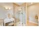 A modern bathroom showcasing a tiled glass shower, vanity, and neutral color palette at 3531 Evans Ridge Dr, Atlanta, GA 30341