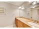 Bathroom featuring double sinks, granite countertops, and neutral walls at 3531 Evans Ridge Dr, Atlanta, GA 30341