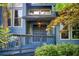 Inviting front porch with a double-door entrance, complemented by lush landscaping and mature trees at 3531 Evans Ridge Dr, Atlanta, GA 30341