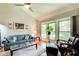 Inviting living room with high ceilings, natural light, comfortable seating, and stylish decor at 3531 Evans Ridge Dr, Atlanta, GA 30341