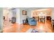 Spacious living room with hardwood floors, seating area, and seamless flow into the dining space at 3531 Evans Ridge Dr, Atlanta, GA 30341