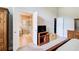 Bedroom view showcasing an ensuite bathroom and walk-in closet access with neutral color palette at 3531 Evans Ridge Dr, Atlanta, GA 30341