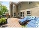 Relaxing back deck with ample seating, string lights and grill at 6211 Traymore Se Trce, Smyrna, GA 30082