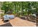 Inviting back deck with comfortable seating and lush green surroundings at 6211 Traymore Se Trce, Smyrna, GA 30082