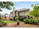 A backyard featuring a deck and lush landscaping at 6211 Traymore Se Trce, Smyrna, GA 30082