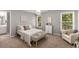 This bedroom features two large windows and comfortable seating at 6211 Traymore Se Trce, Smyrna, GA 30082