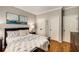 Relaxing bedroom with hardwood floors and neutral paint and trim at 6211 Traymore Se Trce, Smyrna, GA 30082