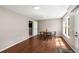 Spacious dining room featuring a wood floor and a view of the yard at 6211 Traymore Se Trce, Smyrna, GA 30082