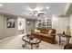 Finished basement living room with built-in shelving and a comfortable sofa at 6211 Traymore Se Trce, Smyrna, GA 30082
