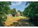 Large lot with mature trees, offering privacy and space for outdoor activities at 1240 Oakland Sw Ter # B, Atlanta, GA 30310