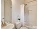Cozy bathroom featuring a shower-tub combo, classic white subway tiles, and a contemporary vanity at 1240 Oakland Sw Ter # B, Atlanta, GA 30310