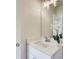 Stylish bathroom vanity with quartz countertop, modern faucet, and decorative accents at 1240 Oakland Sw Ter # B, Atlanta, GA 30310