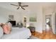 Bedroom with a queen bed, ceiling fan, and view to Primary bathroom at 1240 Oakland Sw Ter # B, Atlanta, GA 30310