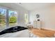 Bright bedroom features wood floors, natural light, and neutral decor for a cozy and relaxing atmosphere at 1240 Oakland Sw Ter # B, Atlanta, GA 30310