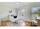 Bright bedroom featuring wood floors, natural light, and neutral decor for a cozy and relaxing atmosphere at 1240 Oakland Sw Ter # B, Atlanta, GA 30310