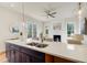 Stylish kitchen featuring stainless steel sink, pendant lighting, granite countertops, and hardwood floors at 1240 Oakland Sw Ter # B, Atlanta, GA 30310