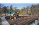 Community playground with multiple slides, swings, and play structures at 1240 Oakland Sw Ter # B, Atlanta, GA 30310