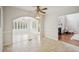 View to the breakfast room, which offers large windows, tiled flooring, and backyard views at 130 White Sands Ct, Suwanee, GA 30024