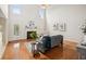 Bright living room with fireplace, hardwood floors, high ceilings and lots of natural light at 130 White Sands Ct, Suwanee, GA 30024