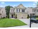 Charming two-story home with a well-manicured lawn and a two-car garage at 133 Worthing Ln, Fairburn, GA 30213