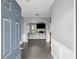 Inviting foyer with tile flooring leading to a spacious living area at 133 Worthing Ln, Fairburn, GA 30213