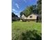 Expansive backyard featuring a deck, offering plenty of space for outdoor enjoyment at 4050 Willow Ridge Rd, Douglasville, GA 30135
