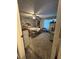 This bedroom is roomy with a ceiling fan and large window at 4050 Willow Ridge Rd, Douglasville, GA 30135