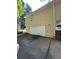 Spacious garage with ample driveway space, ready for your vehicles and projects at 4050 Willow Ridge Rd, Douglasville, GA 30135
