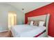 The primary bedroom has a queen bed and good closet access at 12384 Riviera Dr, Fayetteville, GA 30215
