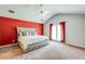 The main bedroom features a queen bed and French doors at 12384 Riviera Dr, Fayetteville, GA 30215