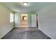 Bedroom with neutral paint and new carpet at 3755 Greentree Dr, Decatur, GA 30032
