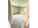 View of carpeted bedroom with windows providing natural light and neutral wall colors at 3755 Greentree Dr, Decatur, GA 30032