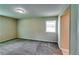 Bedroom featuring neutral walls and new carpet at 3755 Greentree Dr, Decatur, GA 30032