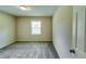 Bedroom featuring neutral walls and new carpet at 3755 Greentree Dr, Decatur, GA 30032