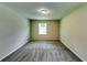 Bedroom featuring neutral walls and new carpet at 3755 Greentree Dr, Decatur, GA 30032