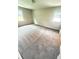 Bright bedroom with neutral walls, plush gray carpet, and natural light from two windows at 3755 Greentree Dr, Decatur, GA 30032