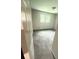View of carpeted bedroom with windows providing natural light and neutral wall colors at 3755 Greentree Dr, Decatur, GA 30032