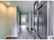A look inside the home's entryway, featuring hardwood floors and neutral-toned walls at 3755 Greentree Dr, Decatur, GA 30032