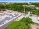 High aerial view showcasing a modern home's rooftop terrace, solar panels, and green surroundings at 417 E College Ave # 302, Decatur, GA 30030