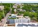 Wide aerial view showing the townhome's rooftop deck, solar panels, and the surrounding neighborhood at 417 E College Ave # 302, Decatur, GA 30030