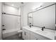 This bright bathroom features a tub and shower combination and double sinks with plenty of counter space at 417 E College Ave # 302, Decatur, GA 30030