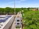 Modern townhome with rooftop patio, solar panels, and stylish exterior design at 417 E College Ave # 302, Decatur, GA 30030