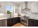 Modern kitchen with stainless steel appliances, white countertops, and stylish backsplash at 417 E College Ave # 302, Decatur, GA 30030
