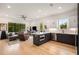Bright living space featuring an open floor plan, modern kitchen, and comfortable seating area at 417 E College Ave # 302, Decatur, GA 30030
