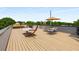 Spacious roof deck featuring a hammock, patio umbrella, and outdoor seating, great for entertaining or relaxing at 417 E College Ave # 302, Decatur, GA 30030