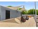 Enjoy outdoor living on this roof deck with canvas shades, patio furniture, and great views at 417 E College Ave # 302, Decatur, GA 30030