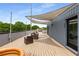 Enjoy outdoor living on this roof deck with canvas shades, patio furniture, and great views at 417 E College Ave # 302, Decatur, GA 30030