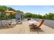 Expansive rooftop deck with cozy hammock, outdoor dining setup, and shaded retreat at 417 E College Ave # 302, Decatur, GA 30030