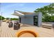 Spacious rooftop deck featuring outdoor seating, shade canopies, and recreational pool for relaxation at 417 E College Ave # 302, Decatur, GA 30030